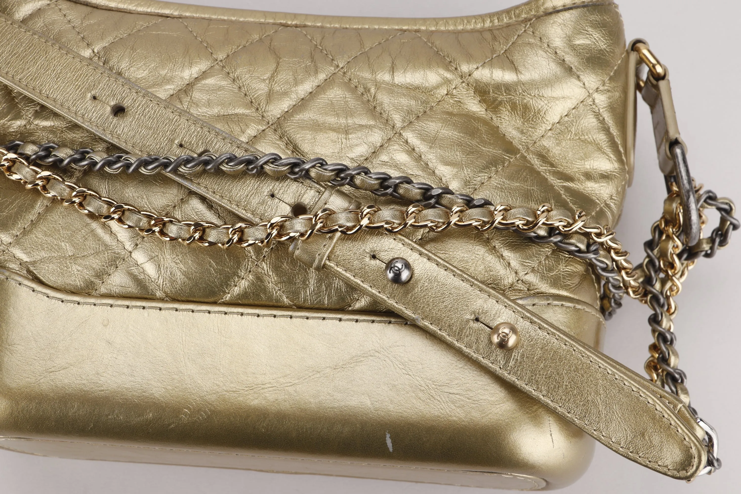 CHANEL GABRIELLE MINI METALLIC GOLD CALF LEATHER SLING BAG (2366xxxx), WITH DUST COVER, NO CARD