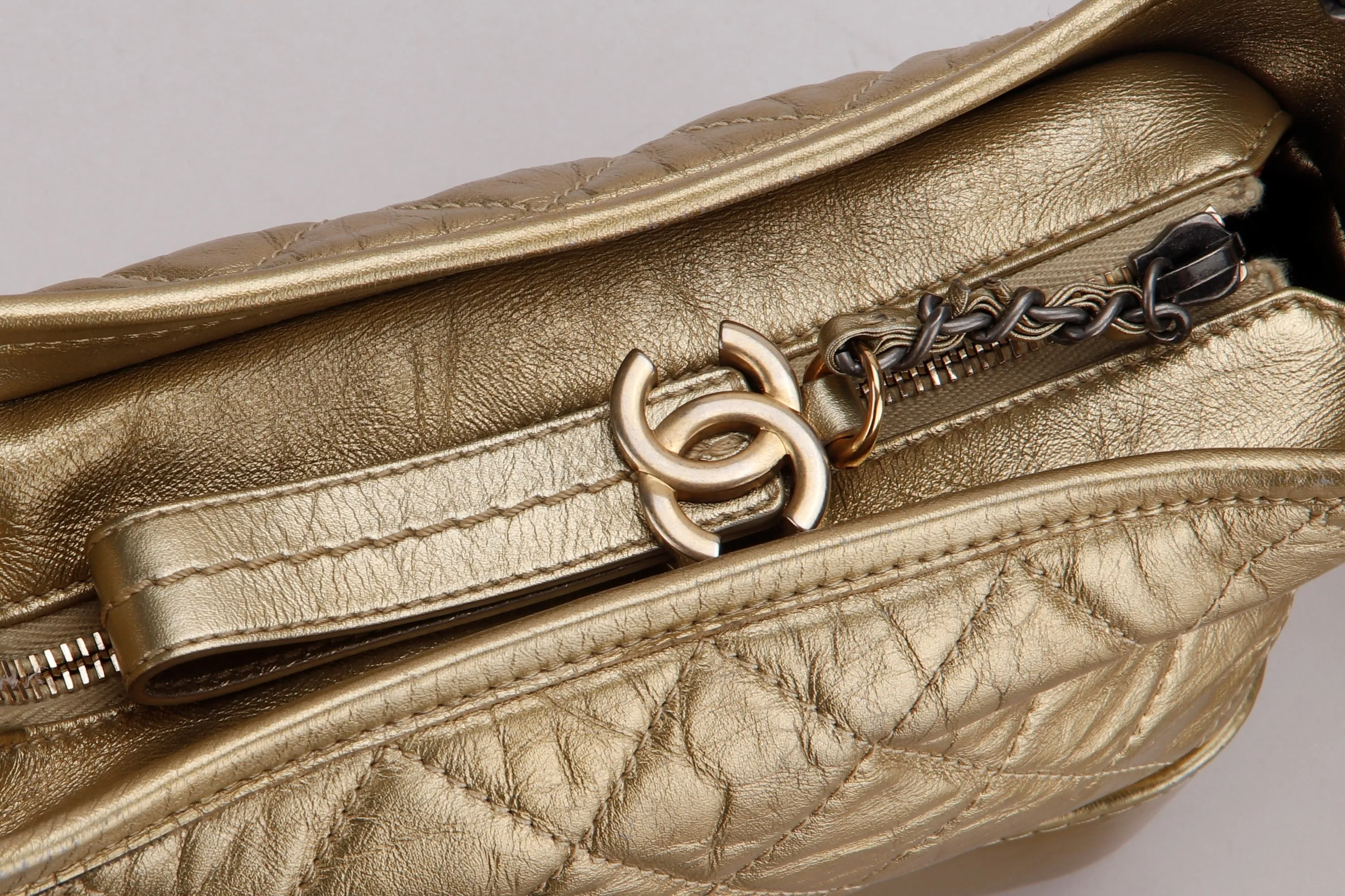 CHANEL GABRIELLE MINI METALLIC GOLD CALF LEATHER SLING BAG (2366xxxx), WITH DUST COVER, NO CARD