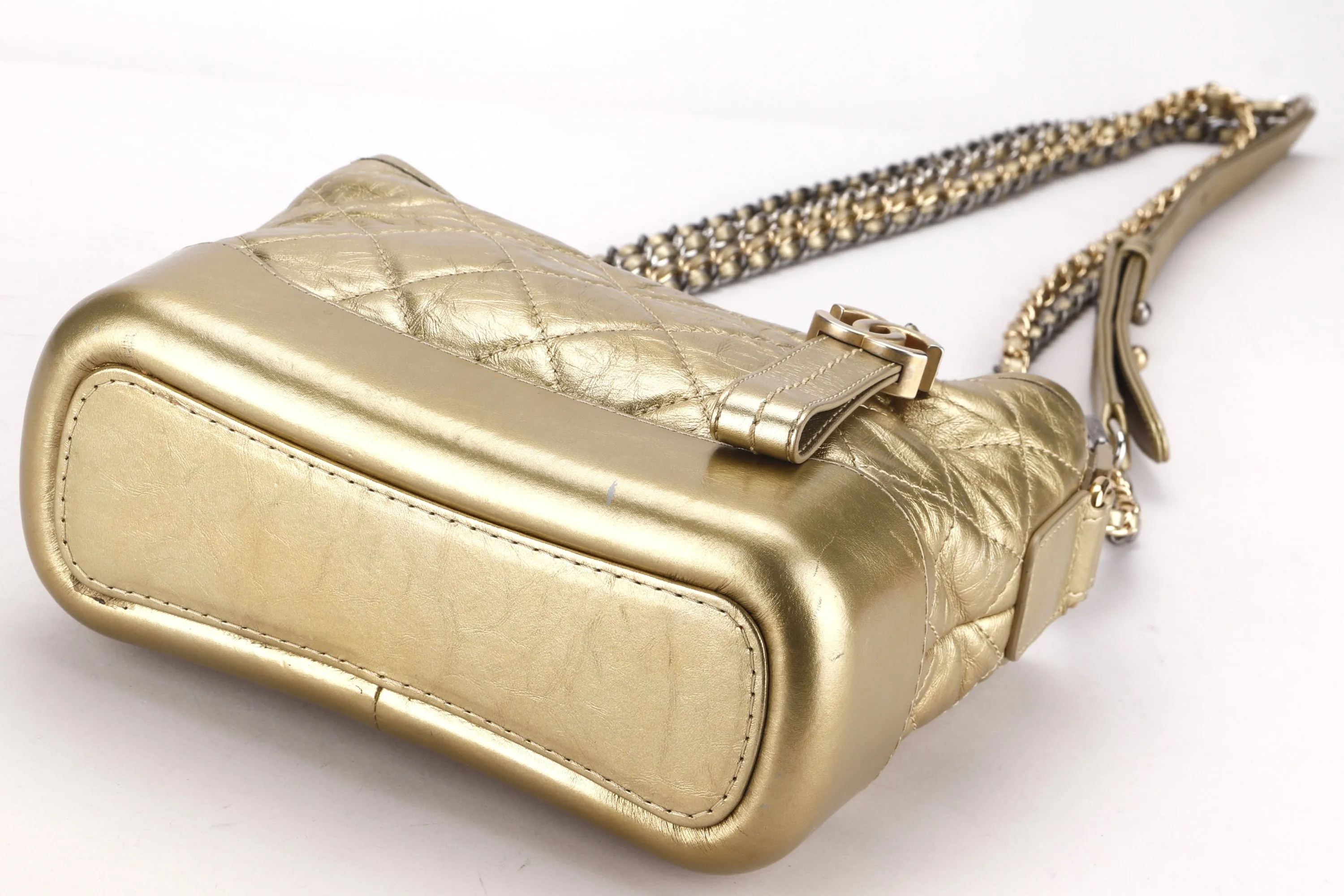 CHANEL GABRIELLE MINI METALLIC GOLD CALF LEATHER SLING BAG (2366xxxx), WITH DUST COVER, NO CARD